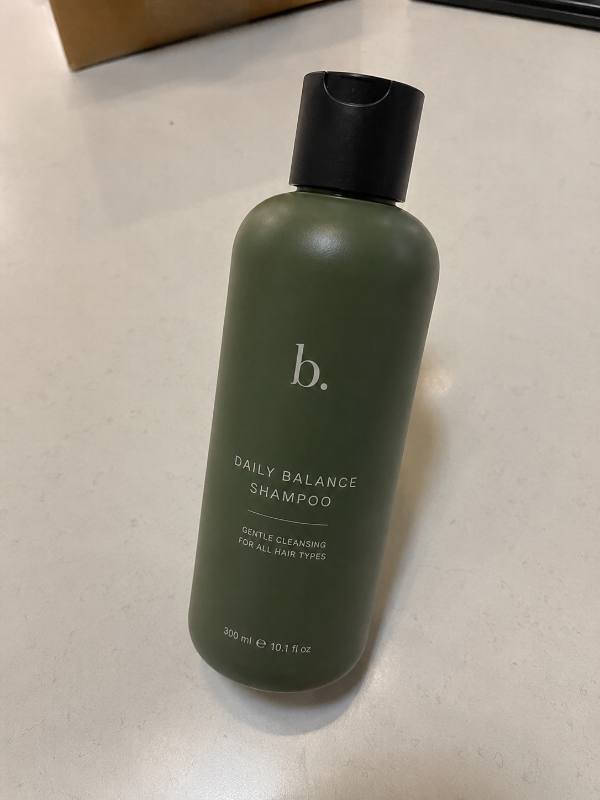Framing the shampoo bottle with a phone